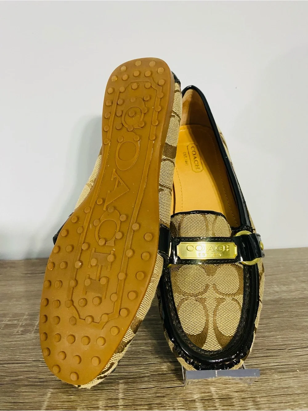 Coach Tan Signature Canvas Loafers with Black Trim and Gold Hardware